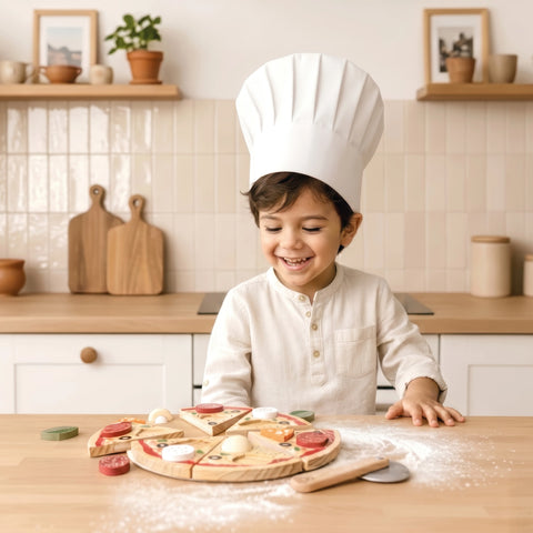Wooden pizza puzzle pieces on a table with a child wearing a chef hat