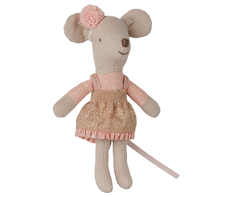Little sister mouse toy wearing a pink polka-dot top and woven dress with ruffle trim.