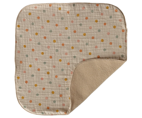 Cream muslin comforter blanket with multicolored dots and a soft plush backing