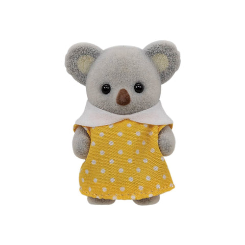 Gray koala plush wearing a yellow polka-dot dress