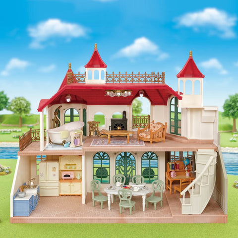 Red Roof Riverside Manor dollhouse interior with dining table, chairs, and veranda