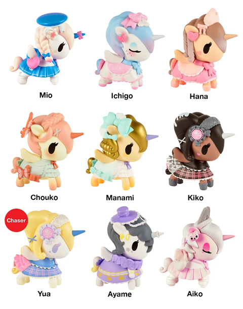 Assorted unicorn blind box figures, blue, pink, tan, and purple outfits shown